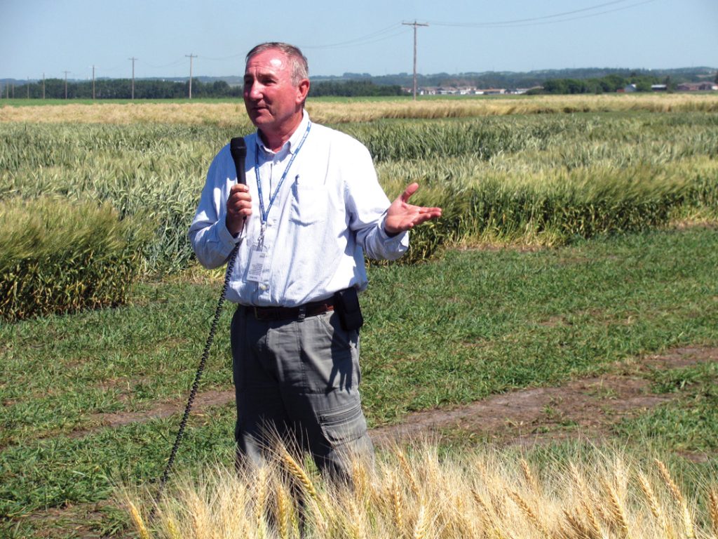 Lacombe-Field-day-2014-Mazen-Aljarrah-speaks-to-local-growers